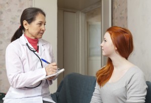doctor asked  female teen patient feels